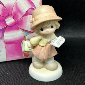 Precious Moments “Thursday's Child Has Far To Go" figurine